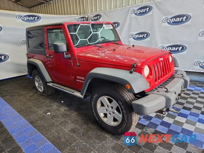 Czwarte zdjęcie samochodu z boku: 2010 JEEP WRANGLER VIN:1J4AA2D17AL136183 - miniatura