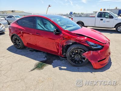 Czwarte zdjęcie samochodu z boku: 2021 TESLA MODEL Y VIN:5YJYGAED5MF177084 - miniatura