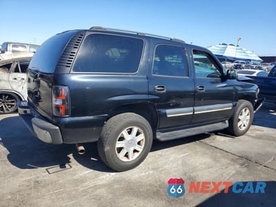 Trzecie zdjęcie samochodu z tyłu: 2004 CHEVROLET TAHOE C1500 VIN:1GNEC13V84R157942 - miniatura