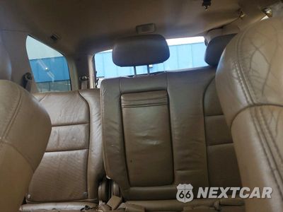 Zdjęcie 10 z 13 samochodu: 2004 ACURA MDX TOURING VIN:2HNYD18944H525235 - miniatura