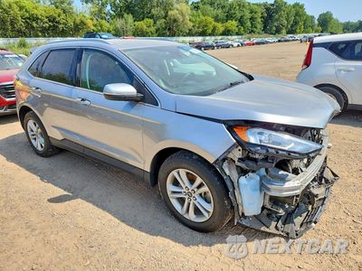 Czwarte zdjęcie samochodu z boku: 2020 FORD EDGE SEL VIN:2FMPK4J98LBB50403 - miniatura