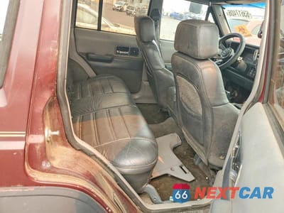 Zdjęcie 10 z 11 samochodu: 1988 JEEP CHEROKEE LIMITED VIN:1JCMT7895JT133632 - miniatura