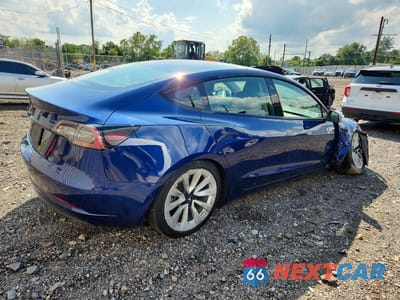 Trzecie zdjęcie samochodu z tyłu: 2022 TESLA MODEL 3 VIN:5YJ3E1EA5NF370844 - miniatura