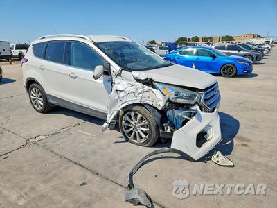 Czwarte zdjęcie samochodu z boku: 2017 FORD ESCAPE TITANIUM VIN:1FMCU0J94HUD21229 - miniatura