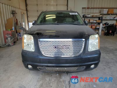 Piąte zdjęcie samochodu w środku: 2007 GMC YUKON VIN:1GKFK13057R127035 - miniatura