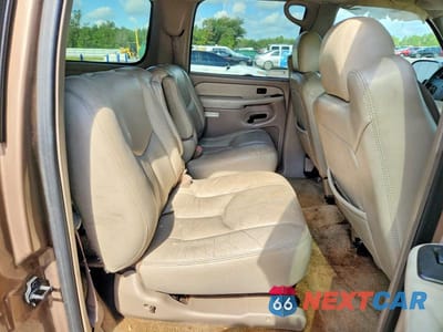 Zdjęcie 11 z 13 samochodu: 2003 GMC YUKON XL C1500 VIN:1GKEC16Z73R219311 - miniatura