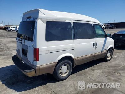 Trzecie zdjęcie samochodu z tyłu: 1997 GMC SAFARI XT VIN:1GKDM19W4VB519703 - miniatura