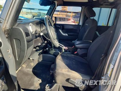 Zdjęcie 7 z 13 samochodu: 2017 JEEP WRANGLER UNLIMITED SAHARA VIN:1C4HJWEGXHL677379 - miniatura