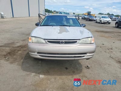Piąte zdjęcie samochodu w środku: 1999 TOYOTA COROLLA VE VIN:1NXBR12E2XZ287868 - miniatura
