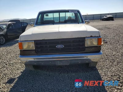 Piąte zdjęcie samochodu w środku: 1987 FORD F150 VIN:1FTDF15YXHPA88644 - miniatura