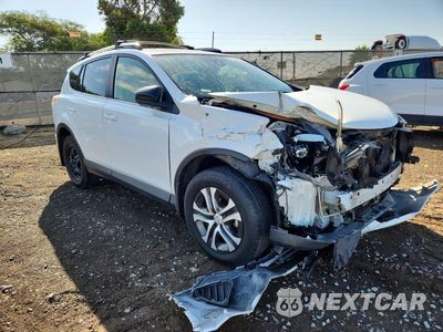 Czwarte zdjęcie samochodu z boku: 2018 TOYOTA RAV4 LE VIN:JTMZFREV9JJ729043 - miniatura
