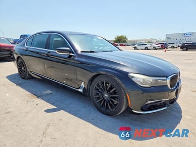 Czwarte zdjęcie samochodu z boku: 2016 BMW 740 I VIN:WBA7E2C50GG503948 - miniatura