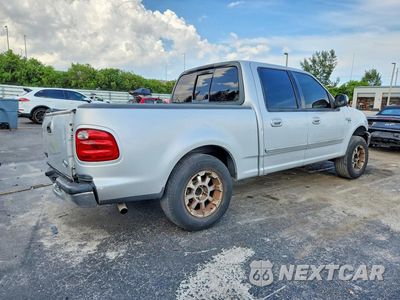 Trzecie zdjęcie samochodu z tyłu: 2002 FORD F150 SUPERCREW VIN:1FTRW07682KE39406 - miniatura