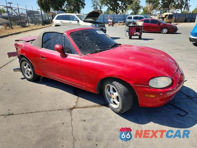 Czwarte zdjęcie samochodu z boku: 1999 MAZDA MX-5 MIATA VIN:JM1NB3534X0116414 - miniatura