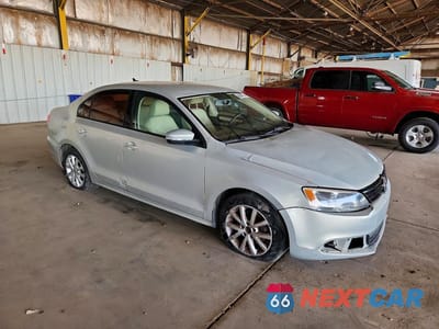Czwarte zdjęcie samochodu z boku: 2011 VOLKSWAGEN JETTA SE VIN:3VWDZ7AJ3BM354261 - miniatura