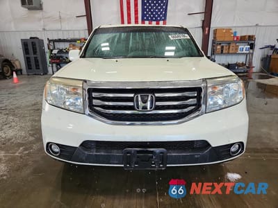 Piąte zdjęcie samochodu w środku: 2015 HONDA PILOT TOURING VIN:5FNYF4H94FB044203 - miniatura