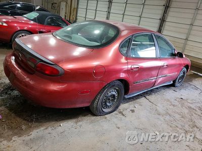 Trzecie zdjęcie samochodu z tyłu: 1999 FORD TAURUS SE VIN:1FAFP53UXXA312855 - miniatura