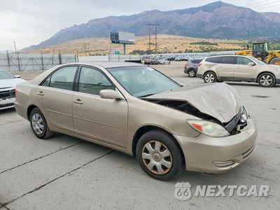 Czwarte zdjęcie samochodu z boku: 2003 TOYOTA CAMRY LE VIN:JTDBE32K330140994 - miniatura