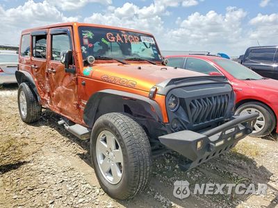Czwarte zdjęcie samochodu z boku: 2011 JEEP WRANGLER UNLIMITED SAHARA VIN:1J4HA5H1XBL572490 - miniatura