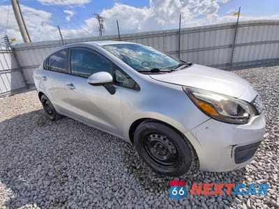 Czwarte zdjęcie samochodu z boku: 2014 KIA RIO LX VIN:KNADM4A31E6368324 - miniatura