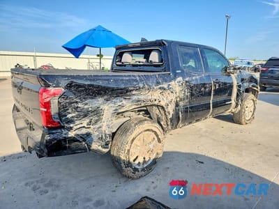 Trzecie zdjęcie samochodu z tyłu: 2025 TOYOTA TACOMA SR5 VIN:3TMLB5JN3SM178306 - miniatura