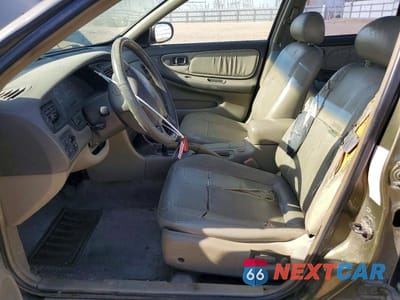 Zdjęcie 7 z 13 samochodu: 1998 NISSAN ALTIMA XE VIN:1N4DL01D3WC193493 - miniatura