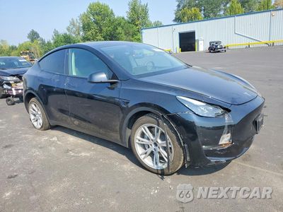 Czwarte zdjęcie samochodu z boku: 2022 TESLA MODEL Y VIN:7SAYGDEE8NF559897 - miniatura