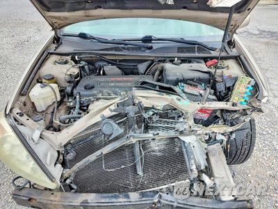 Zdjęcie 11 z 12 samochodu: 2004 TOYOTA CAMRY LE VIN:4T1BE32K24U817846 - miniatura