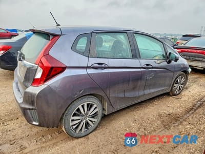 Trzecie zdjęcie samochodu z tyłu: 2017 HONDA FIT EX VIN:3HGGK5H74HM704560 - miniatura