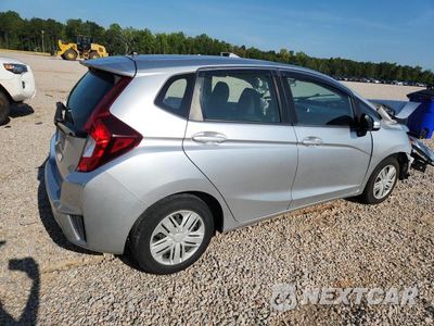 Trzecie zdjęcie samochodu z tyłu: 2016 HONDA FIT LX VIN:JHMGK5H51GX011045 - miniatura