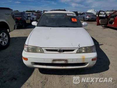 Piąte zdjęcie samochodu w środku: 1997 TOYOTA COROLLA DX VIN:1NXBB02E0VZ613792 - miniatura