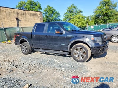 Czwarte zdjęcie samochodu z boku: 2014 FORD F150 SUPERCREW VIN:1FTFW1ET6EFC65849 - miniatura