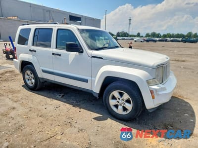Czwarte zdjęcie samochodu z boku: 2010 JEEP LIBERTY SPORT VIN:1J4PN2GK4AW109010 - miniatura