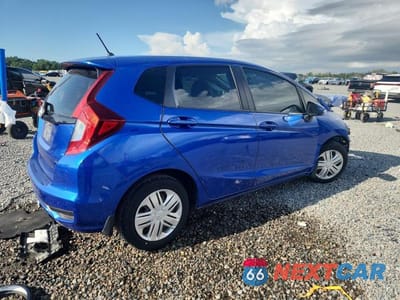 Trzecie zdjęcie samochodu z tyłu: 2018 HONDA FIT LX VIN:3HGGK5H49JM702301 - miniatura