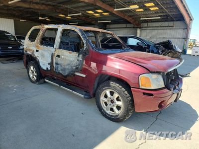 Czwarte zdjęcie samochodu z boku: 2002 GMC ENVOY VIN:1GKDT13SX22394078 - miniatura