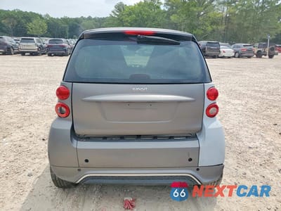 Zdjęcie 6 z 12 samochodu: 2013 SMART FORTWO PURE VIN:WMEEJ3BA2DK688749 - miniatura