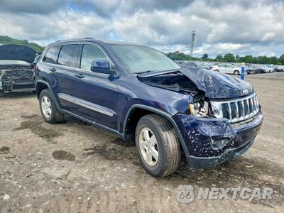 Czwarte zdjęcie samochodu z boku: 2013 JEEP GRAND CHEROKEE LAREDO VIN:1C4RJFAG9DC505588 - miniatura