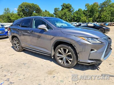 Czwarte zdjęcie samochodu z boku: 2019 LEXUS RX 450HL BASE VIN:JTJDGKCA8K2007733 - miniatura