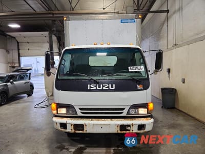 Piąte zdjęcie samochodu w środku: 2000 ISUZU NPR VIN:4KLC4B1R2YJ802307 - miniatura