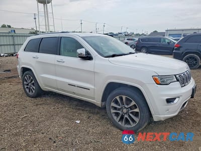 Czwarte zdjęcie samochodu z boku: 2018 JEEP GRAND CHEROKEE OVERLAND VIN:1C4RJECG8JC289168 - miniatura