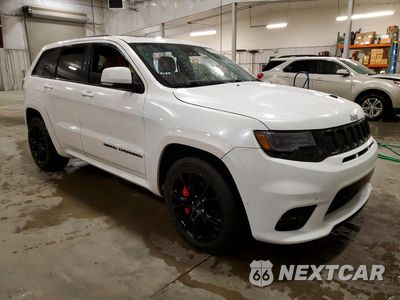 Czwarte zdjęcie samochodu z boku: 2017 JEEP GRAND CHEROKEE SRT-8 VIN:1C4RJFDJ6HC815937 - miniatura