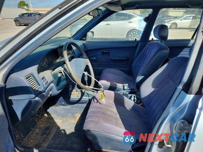Zdjęcie 7 z 12 samochodu: 1992 TOYOTA COROLLA DELUXE VIN:1NXAE94A6NZ378543 - miniatura