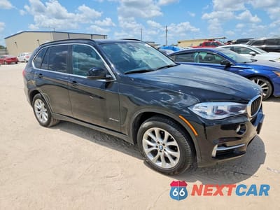 Czwarte zdjęcie samochodu z boku: 2016 BMW X5 SDRIVE35I VIN:5UXKR2C50G0H43187 - miniatura