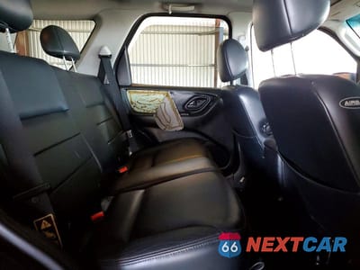 Zdjęcie 11 z 14 samochodu: 2003 FORD ESCAPE LIMITED VIN:1FMCU04173KA05172 - miniatura
