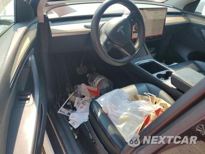 Zdjęcie 8 z 12 samochodu: 2023 TESLA MODEL Y VIN:7SAYGDEE6PA081804 - miniatura