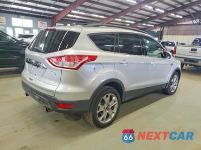 Trzecie zdjęcie samochodu z tyłu: 2013 FORD ESCAPE SEL VIN:1FMCU9H9XDUC51093 - miniatura