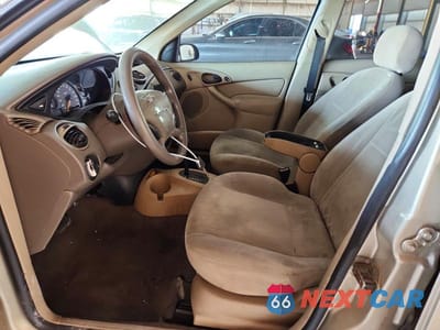 Zdjęcie 7 z 13 samochodu: 2000 FORD FOCUS SE VIN:1FAFP3630YW229639 - miniatura