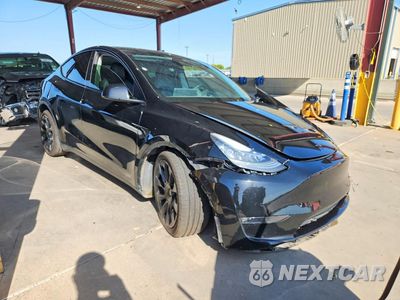 Czwarte zdjęcie samochodu z boku: 2021 TESLA MODEL Y VIN:5YJYGDEE7MF245606 - miniatura
