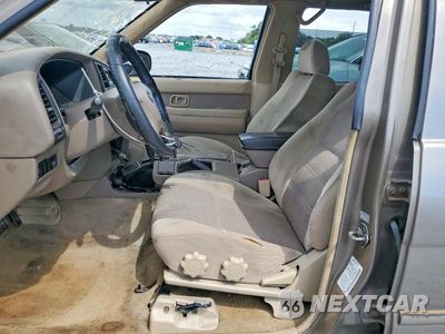 Zdjęcie 7 z 13 samochodu: 2002 NISSAN PATHFINDER SE VIN:JN8DR09X82W653638 - miniatura