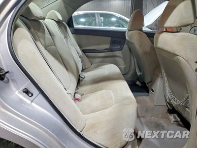 Zdjęcie 10 z 13 samochodu: 2005 KIA SPECTRA LX VIN:KNAFE121X55155881 - miniatura